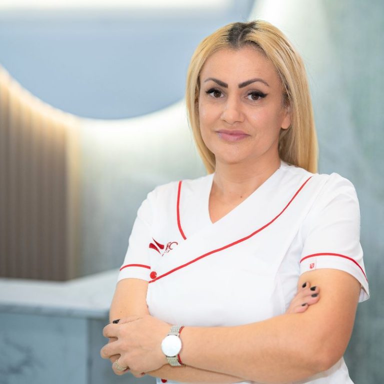 Dr. Fatma Takouzli